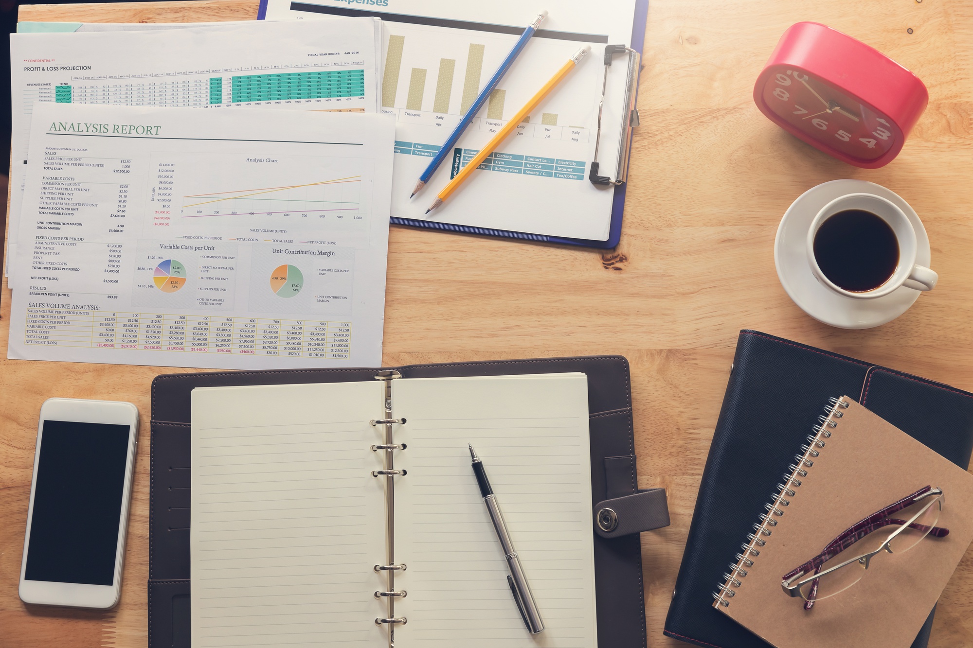 Consultation notes and charts on desk